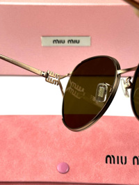 MIU MIU – SMU 53Y