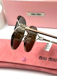 MIU MIU – SMU 53Y